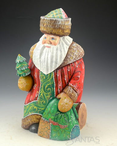 Red and Green Russian Santa With Little Tree Sitting on a Log 10 inch