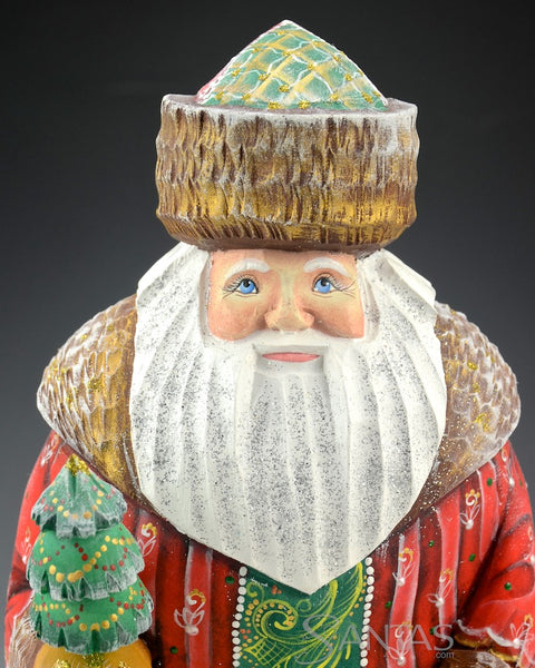 Red and Green Russian Santa With Little Tree Sitting on a Log 10 inch